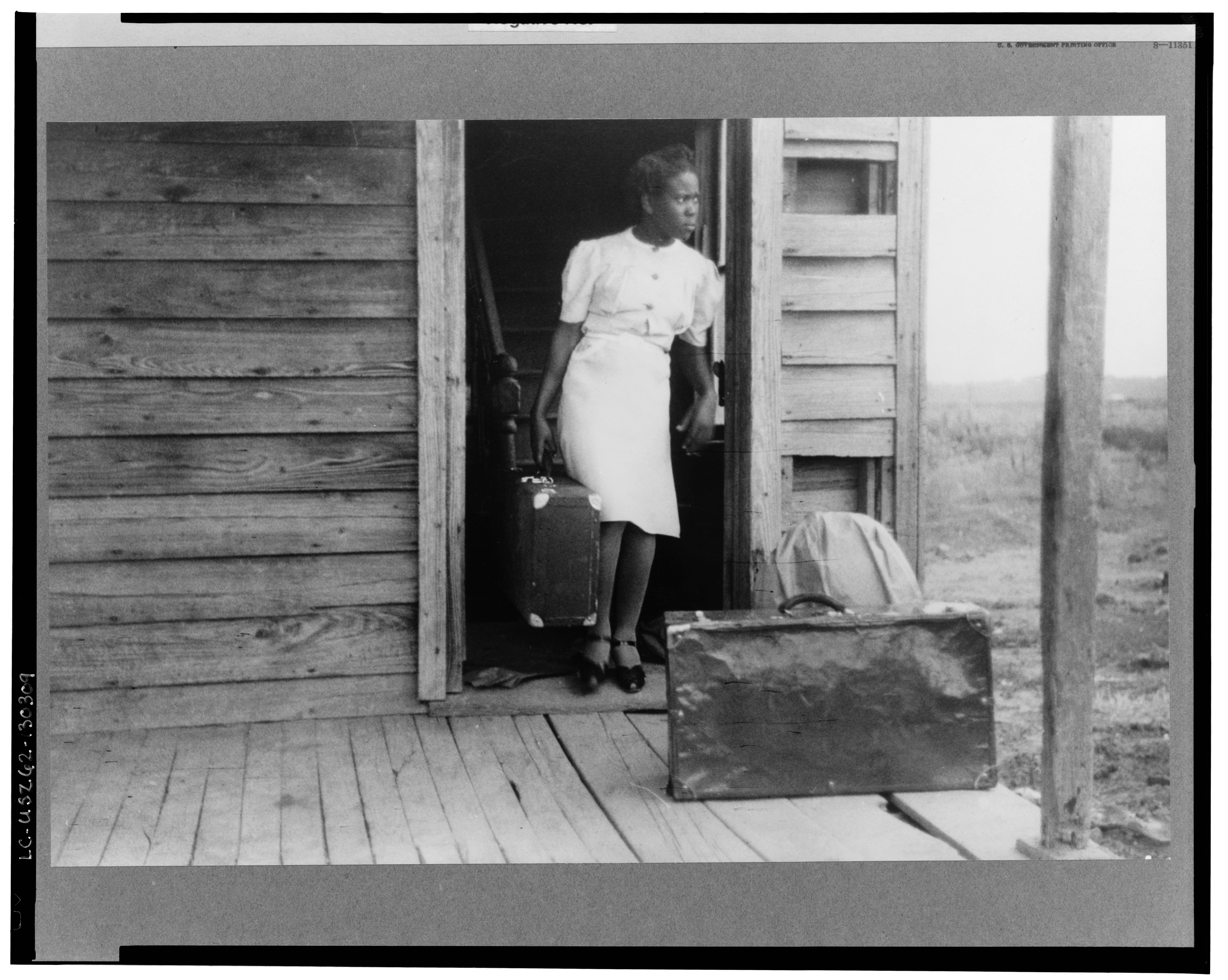 A Florida woman gathers her luggage for the journey north. From the Library of Congress.